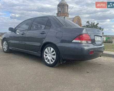 Чорний Міцубісі Lancer, об'ємом двигуна 1.6 л та пробігом 162 тис. км за 4650 $, фото 7 на Automoto.ua