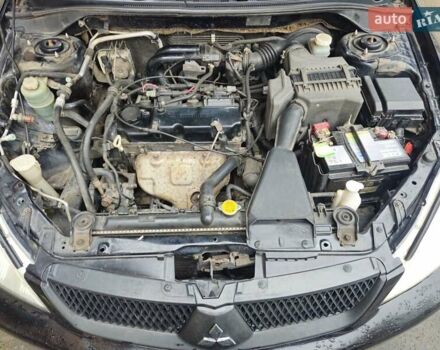 Чорний Міцубісі Lancer, об'ємом двигуна 1.59 л та пробігом 180 тис. км за 4999 $, фото 19 на Automoto.ua