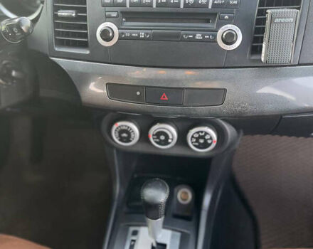 Черный Мицубиси Лансер, объемом двигателя 2 л и пробегом 193 тыс. км за 7500 $, фото 10 на Automoto.ua