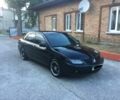 Чорний Міцубісі Lancer, об'ємом двигуна 1.6 л та пробігом 255 тис. км за 7000 $, фото 1 на Automoto.ua
