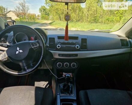 Чорний Міцубісі Lancer, об'ємом двигуна 2 л та пробігом 247 тис. км за 5500 $, фото 12 на Automoto.ua