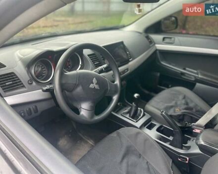 Черный Мицубиси Лансер, объемом двигателя 1.5 л и пробегом 270 тыс. км за 4999 $, фото 10 на Automoto.ua