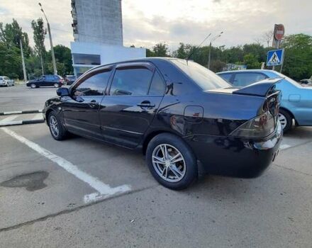 Чорний Міцубісі Lancer, об'ємом двигуна 1.6 л та пробігом 204 тис. км за 4200 $, фото 12 на Automoto.ua