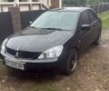 Чорний Міцубісі Lancer, об'ємом двигуна 1.6 л та пробігом 210 тис. км за 4200 $, фото 1 на Automoto.ua