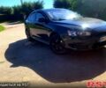 Черный Мицубиси Лансер, объемом двигателя 1.5 л и пробегом 235 тыс. км за 4300 $, фото 1 на Automoto.ua