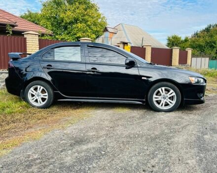 Чорний Міцубісі Lancer, об'ємом двигуна 2 л та пробігом 284 тис. км за 6200 $, фото 2 на Automoto.ua