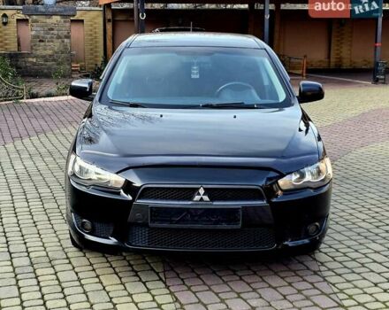 Чорний Міцубісі Lancer, об'ємом двигуна 2 л та пробігом 260 тис. км за 6555 $, фото 5 на Automoto.ua