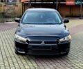 Чорний Міцубісі Lancer, об'ємом двигуна 2 л та пробігом 260 тис. км за 6555 $, фото 5 на Automoto.ua