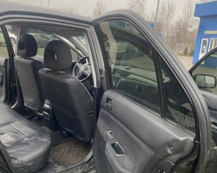 Черный Мицубиси Лансер, объемом двигателя 1.58 л и пробегом 263 тыс. км за 4000 $, фото 32 на Automoto.ua