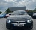 Чорний Міцубісі Lancer, об'ємом двигуна 2 л та пробігом 229 тис. км за 6600 $, фото 1 на Automoto.ua