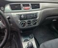 Чорний Міцубісі Lancer, об'ємом двигуна 1.6 л та пробігом 152 тис. км за 4999 $, фото 1 на Automoto.ua