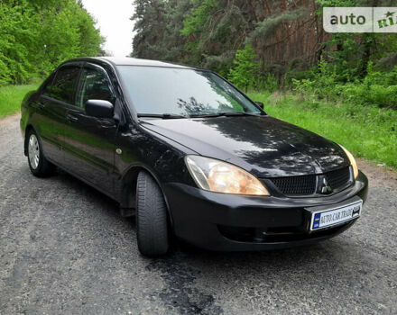 Чорний Міцубісі Lancer, об'ємом двигуна 1.6 л та пробігом 222 тис. км за 4850 $, фото 72 на Automoto.ua