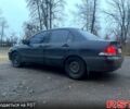 Черный Мицубиси Лансер, объемом двигателя 1.6 л и пробегом 201 тыс. км за 4000 $, фото 7 на Automoto.ua