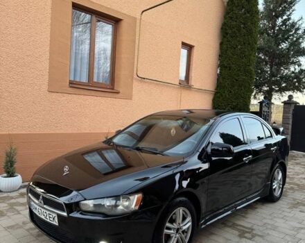 Черный Мицубиси Лансер, объемом двигателя 2 л и пробегом 247 тыс. км за 4700 $, фото 3 на Automoto.ua