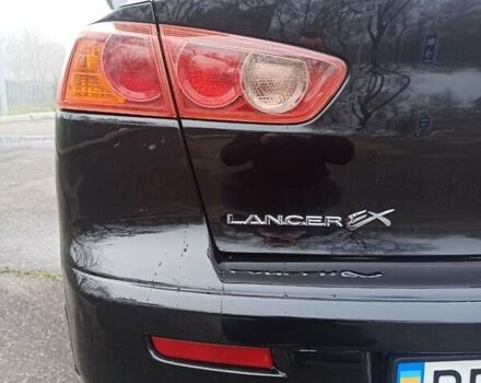 Черный Мицубиси Лансер, объемом двигателя 2 л и пробегом 195 тыс. км за 7899 $, фото 28 на Automoto.ua