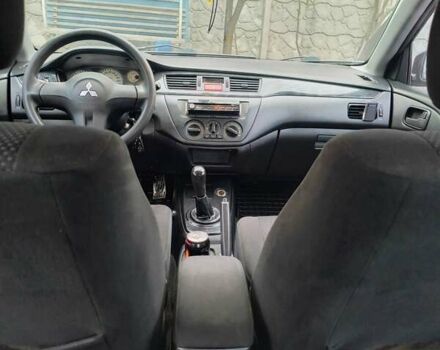 Черный Мицубиси Лансер, объемом двигателя 1.6 л и пробегом 309 тыс. км за 4000 $, фото 23 на Automoto.ua