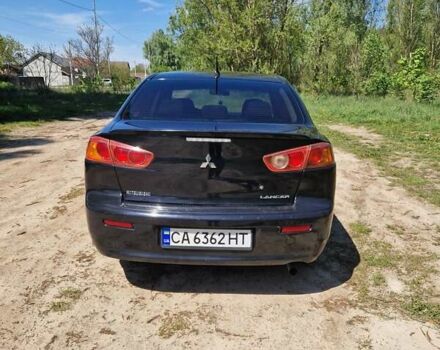 Чорний Міцубісі Lancer, об'ємом двигуна 2 л та пробігом 247 тис. км за 5500 $, фото 4 на Automoto.ua