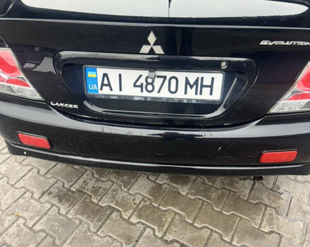 Чорний Міцубісі Lancer, об'ємом двигуна 2 л та пробігом 210 тис. км за 5500 $, фото 10 на Automoto.ua