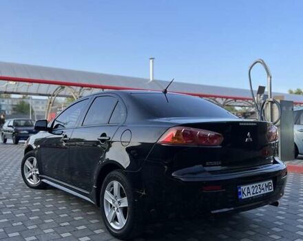 Чорний Міцубісі Lancer, об'ємом двигуна 2 л та пробігом 188 тис. км за 6900 $, фото 10 на Automoto.ua