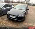Черный Мицубиси Лансер, объемом двигателя 2 л и пробегом 247 тыс. км за 8000 $, фото 1 на Automoto.ua