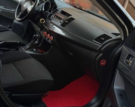 Черный Мицубиси Лансер, объемом двигателя 2 л и пробегом 247 тыс. км за 4700 $, фото 8 на Automoto.ua