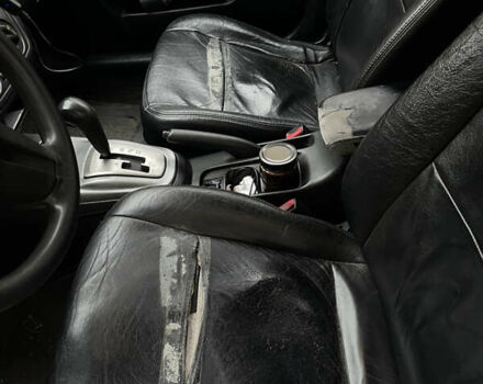 Чорний Міцубісі Lancer, об'ємом двигуна 1.6 л та пробігом 213 тис. км за 3000 $, фото 9 на Automoto.ua