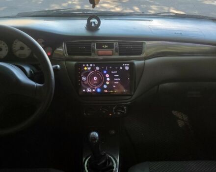 Чорний Міцубісі Lancer, об'ємом двигуна 1.6 л та пробігом 221 тис. км за 4600 $, фото 11 на Automoto.ua