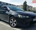 Чорний Міцубісі Lancer, об'ємом двигуна 2 л та пробігом 194 тис. км за 6000 $, фото 1 на Automoto.ua