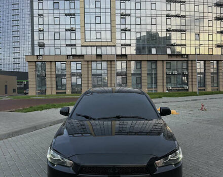 Черный Мицубиси Лансер, объемом двигателя 2 л и пробегом 245 тыс. км за 6200 $, фото 3 на Automoto.ua