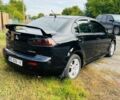Чорний Міцубісі Lancer, об'ємом двигуна 2 л та пробігом 284 тис. км за 6200 $, фото 3 на Automoto.ua