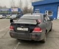 Черный Мицубиси Лансер, объемом двигателя 1.58 л и пробегом 263 тыс. км за 4000 $, фото 38 на Automoto.ua
