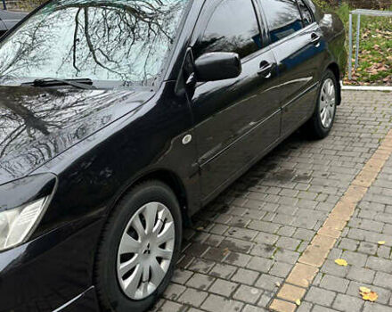 Чорний Міцубісі Lancer, об'ємом двигуна 1.59 л та пробігом 300 тис. км за 3400 $, фото 6 на Automoto.ua