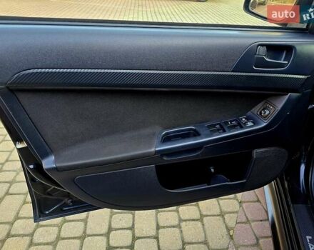 Чорний Міцубісі Lancer, об'ємом двигуна 2 л та пробігом 260 тис. км за 6555 $, фото 19 на Automoto.ua