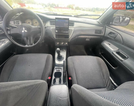 Чорний Міцубісі Lancer, об'ємом двигуна 1.6 л та пробігом 162 тис. км за 4650 $, фото 12 на Automoto.ua