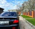 Черный Мицубиси Лансер, объемом двигателя 1.6 л и пробегом 169 тыс. км за 4900 $, фото 1 на Automoto.ua