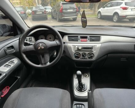 Черный Мицубиси Лансер, объемом двигателя 1.6 л и пробегом 173 тыс. км за 4700 $, фото 13 на Automoto.ua