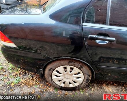 Черный Мицубиси Лансер, объемом двигателя 1.6 л и пробегом 171 тыс. км за 4350 $, фото 5 на Automoto.ua