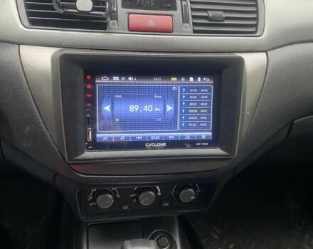 Черный Мицубиси Лансер, объемом двигателя 1.58 л и пробегом 263 тыс. км за 4000 $, фото 10 на Automoto.ua