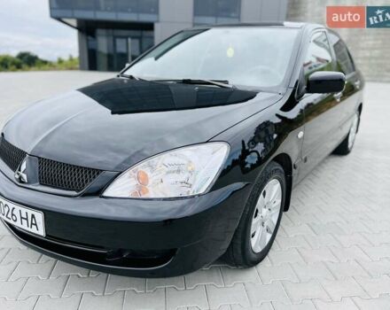 Чорний Міцубісі Lancer, об'ємом двигуна 1.6 л та пробігом 243 тис. км за 4950 $, фото 28 на Automoto.ua