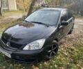 Міцубісі Lancer 2007 у Каневе на Automoto.ua Чорний Міцубісі Lancer, об'ємом двигуна 1.6 л та пробігом 310 тис. км за 4100 $, фото 1 на Automoto.ua