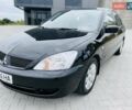 Чорний Міцубісі Lancer, об'ємом двигуна 1.6 л та пробігом 243 тис. км за 4950 $, фото 28 на Automoto.ua