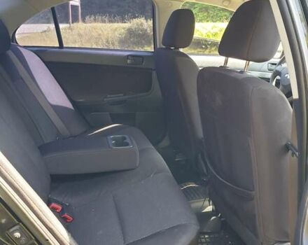 Черный Мицубиси Лансер, объемом двигателя 1.5 л и пробегом 240 тыс. км за 6900 $, фото 4 на Automoto.ua