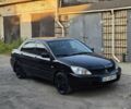 Чорний Міцубісі Lancer, об'ємом двигуна 1.6 л та пробігом 260 тис. км за 4286 $, фото 1 на Automoto.ua