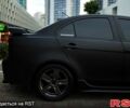Чорний Міцубісі Lancer, об'ємом двигуна 2 л та пробігом 204 тис. км за 7000 $, фото 4 на Automoto.ua
