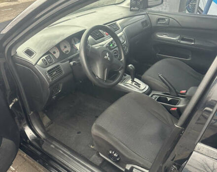 Чорний Міцубісі Lancer, об'ємом двигуна 1.6 л та пробігом 270 тис. км за 4500 $, фото 3 на Automoto.ua