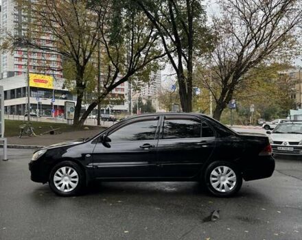 Черный Мицубиси Лансер, объемом двигателя 1.6 л и пробегом 107 тыс. км за 4990 $, фото 7 на Automoto.ua