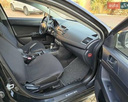 Чорний Міцубісі Lancer, об'ємом двигуна 2 л та пробігом 260 тис. км за 6555 $, фото 39 на Automoto.ua