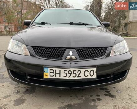 Черный Мицубиси Лансер, объемом двигателя 1.6 л и пробегом 164 тыс. км за 5200 $, фото 5 на Automoto.ua