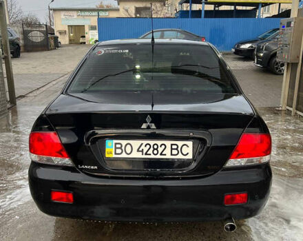 Черный Мицубиси Лансер, объемом двигателя 1.6 л и пробегом 180 тыс. км за 3499 $, фото 10 на Automoto.ua