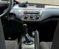 Чорний Міцубісі Lancer, об'ємом двигуна 1.58 л та пробігом 135 тис. км за 4100 $, фото 11 на Automoto.ua